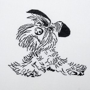 Cross Stitch Embroidery picture of a black doggy for framing