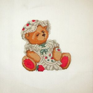 Cross Stitch Embroidery picture of a teddy bear with needlework for framing