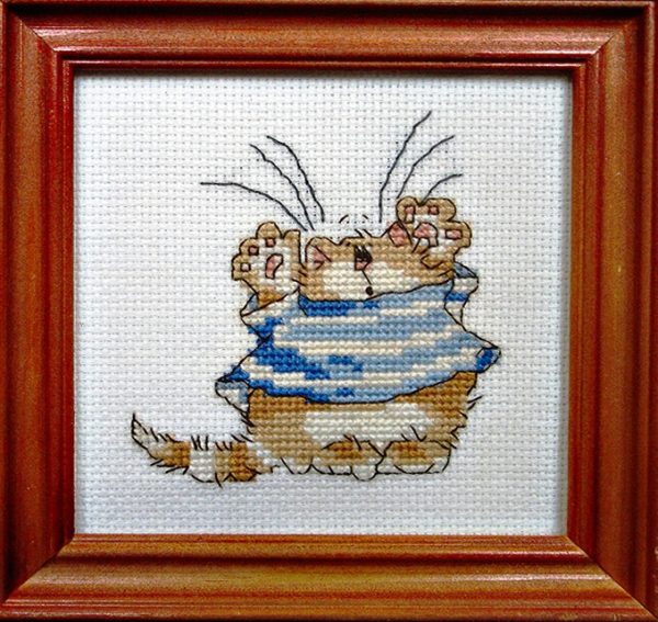 Framed Cross Stitch Embroidery picture of a cat in a blue dress